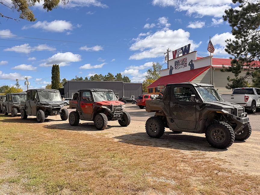 ATV's lined up in front of building