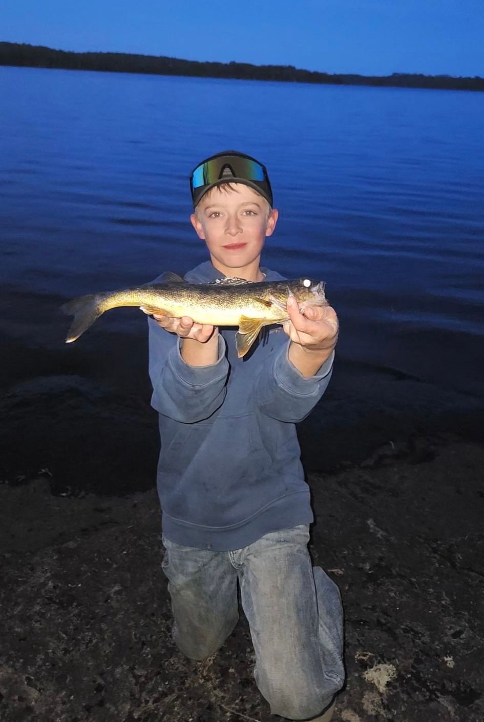 Ryder Baars with a walleye