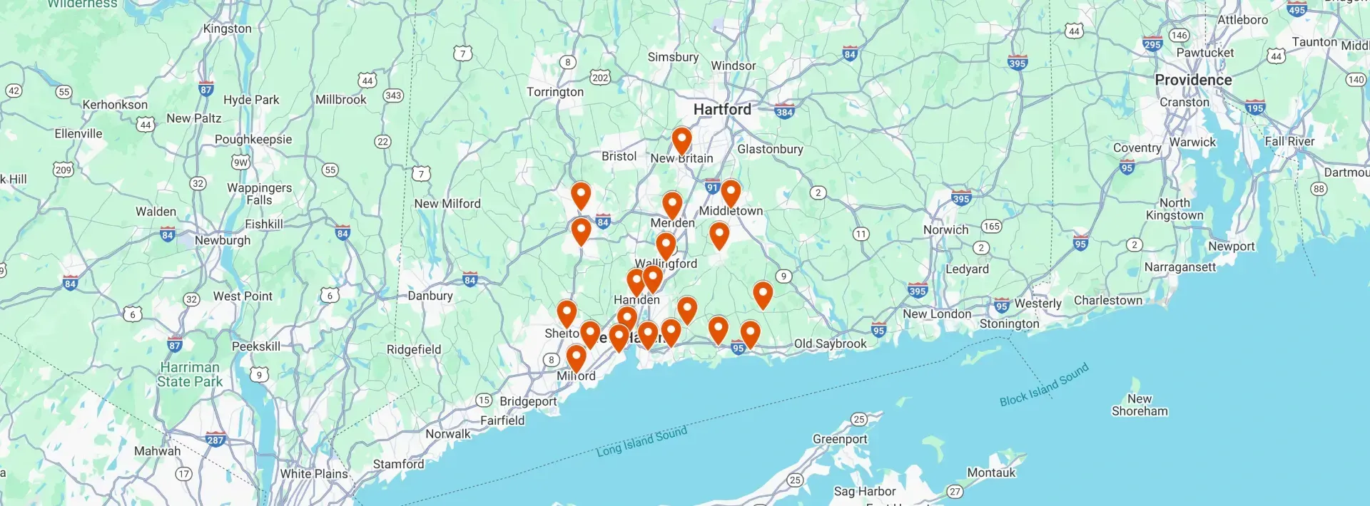 A map of southern Connecticut with orange pin markers clustered in the New Haven and Shoreline areas.