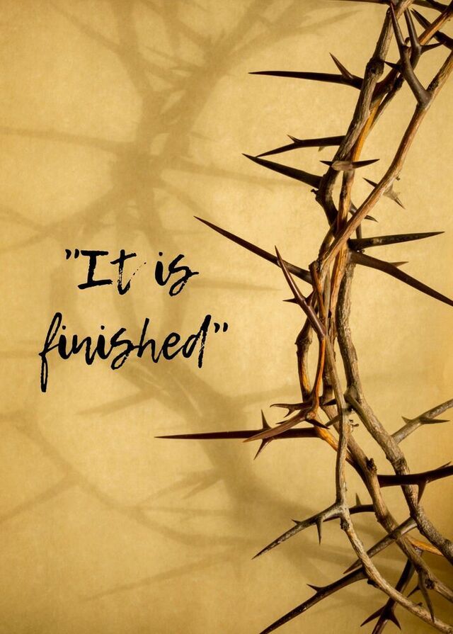 A crown of thorns on a parchment background with the words
