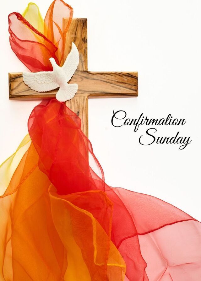 A wooden cross with a white dove and cascading red, orange, and yellow fabric, titled