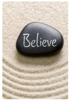 A smooth, black stone with the word