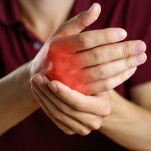 Person with arthritis in their hand