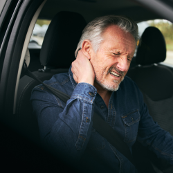 person with neck pain from whiplash