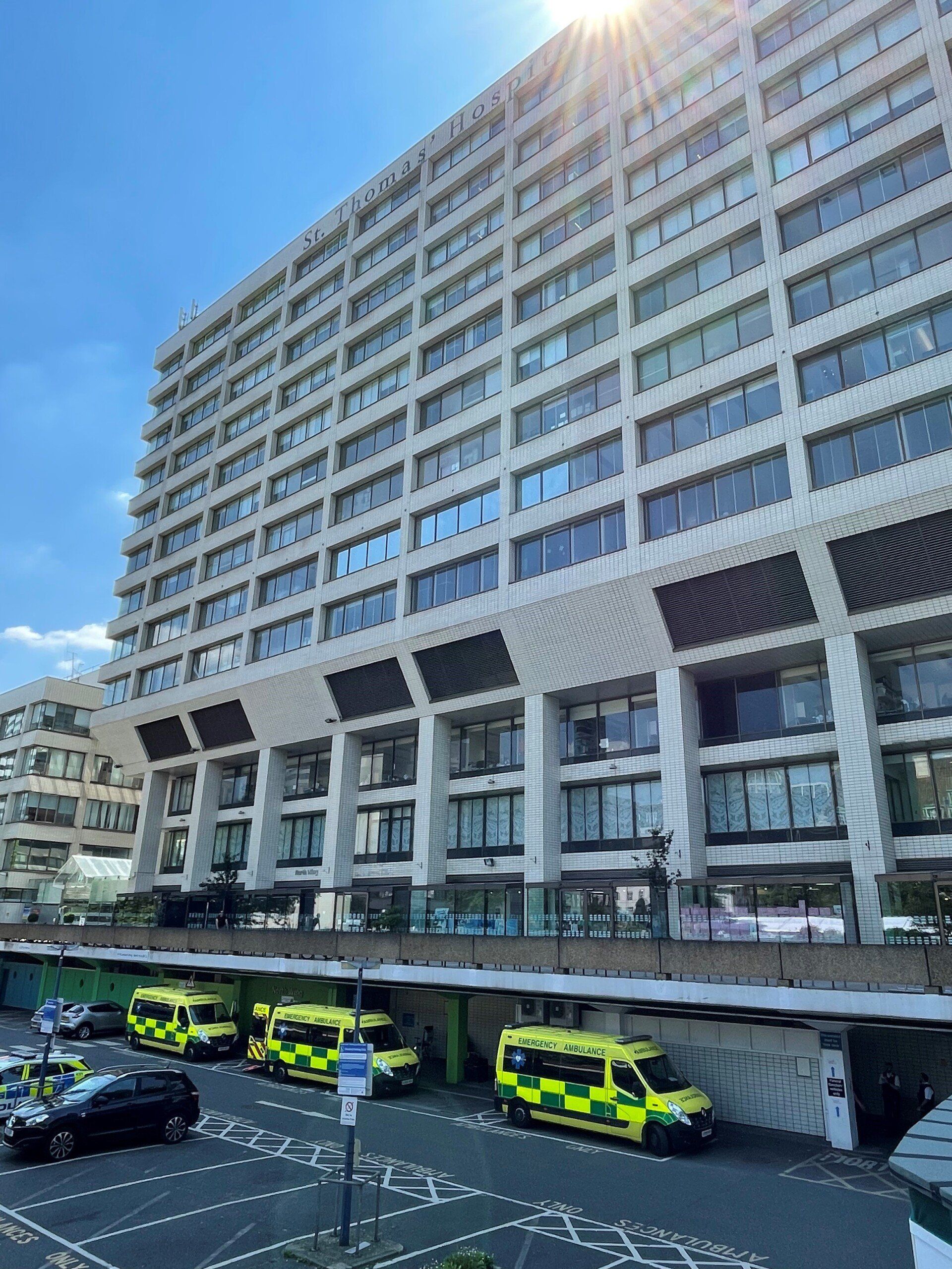 Hearts First Ambulance Service vehicles outside a hospital
