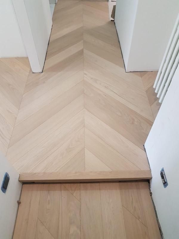 il logo di porcelanosa è in bianco e nero su sfondo bianco .
