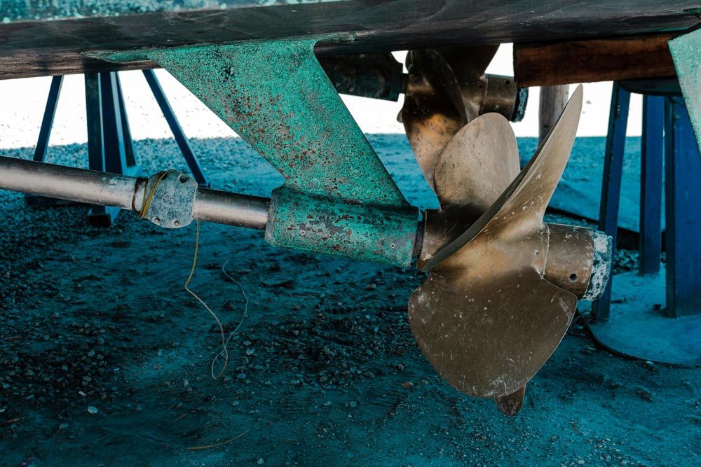 The Propeller of A Boat Is Sitting on The Ground — Ashby Boat Builders In Buddina, QLD