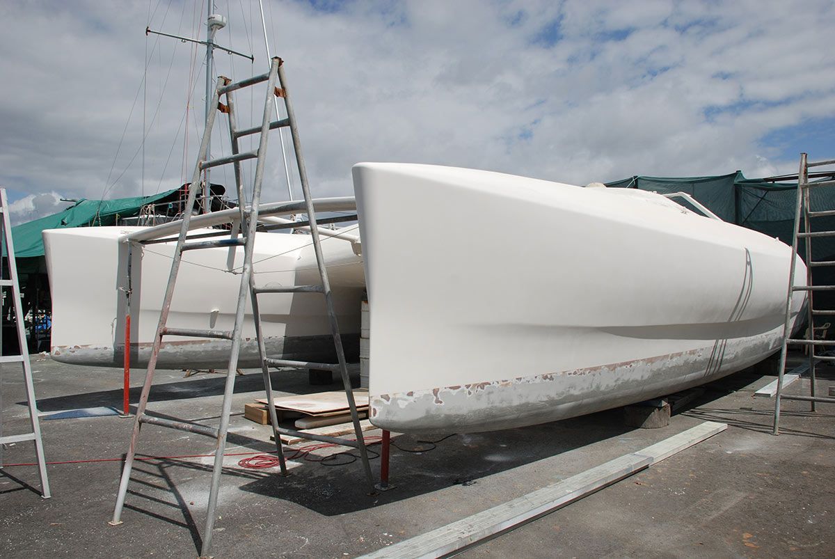 A White Boat with A Ladder Attached to It — Ashby Boat Builders In Buddina, QLD