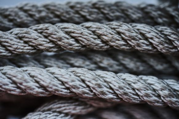 A Close up Of a Gray Rope on A Table — Ashby Boat Builders In Buddina, QLD