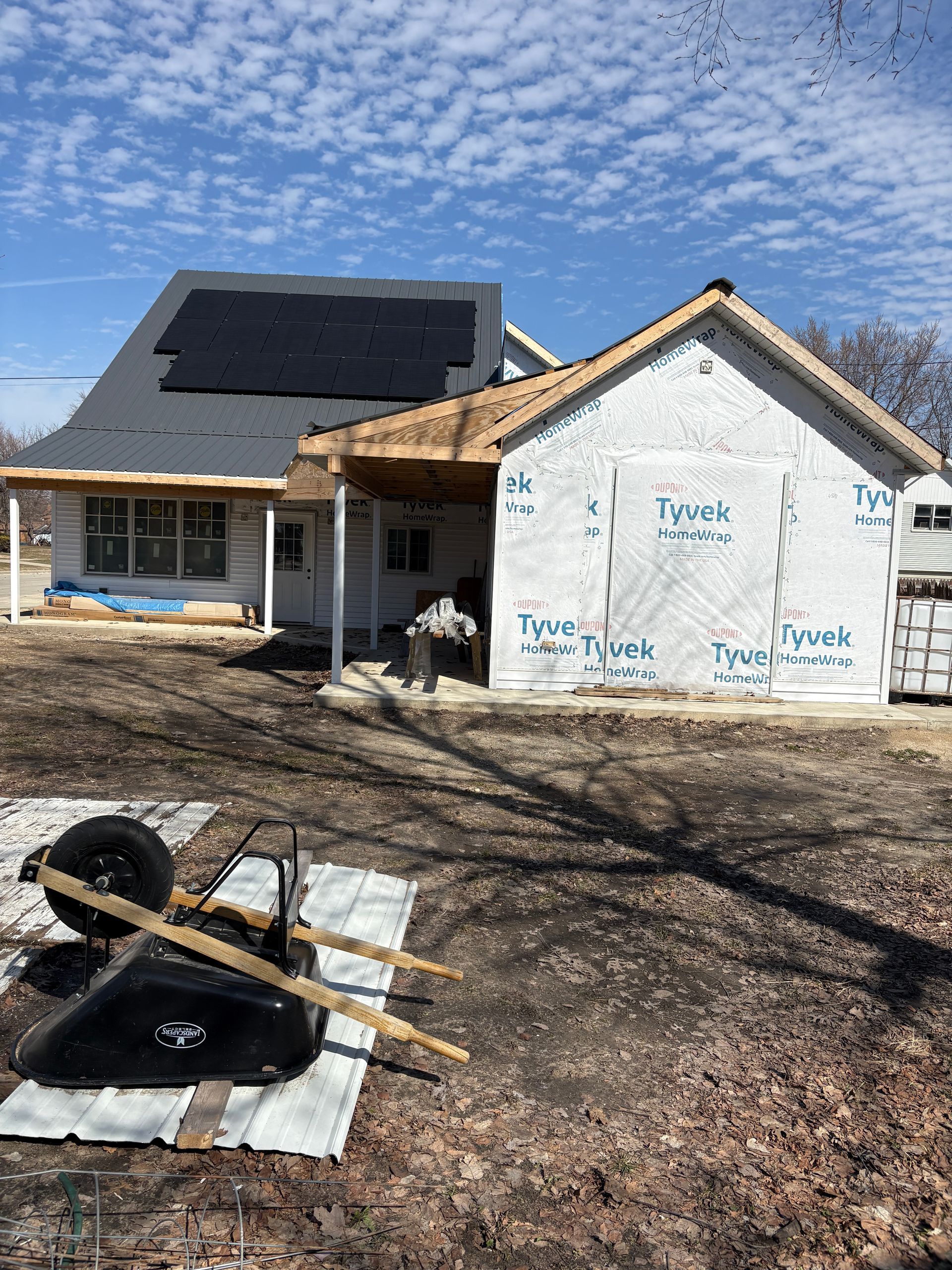 Professional building and remodeling of a home addition and porch in Lansing, Iowa.