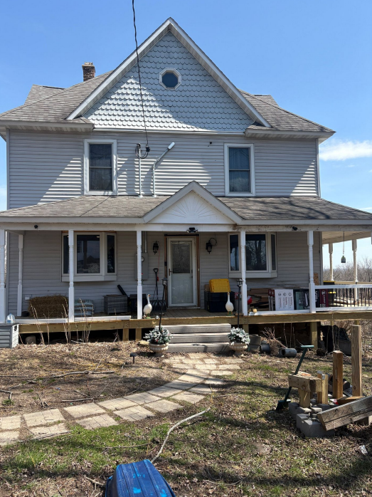 After remodeling front facade and porch view in Lansing, IA.