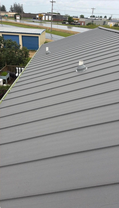 Standing seam metal roofing installation in Lansing, IA.