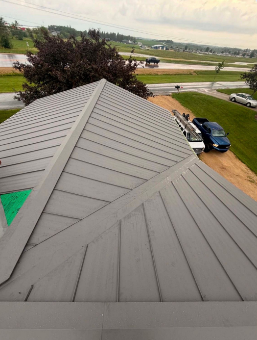 Metal roof replacement project on a home in Lansing, IA.