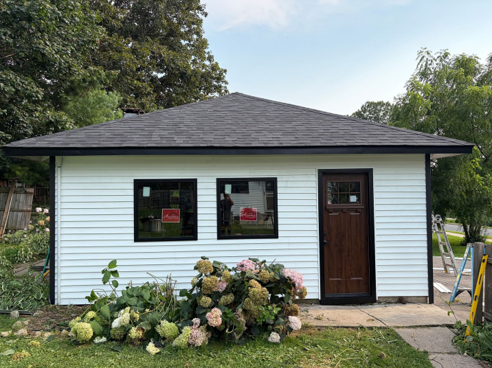 Front view of home remodeling with new siding and windows in Lansing, IA.