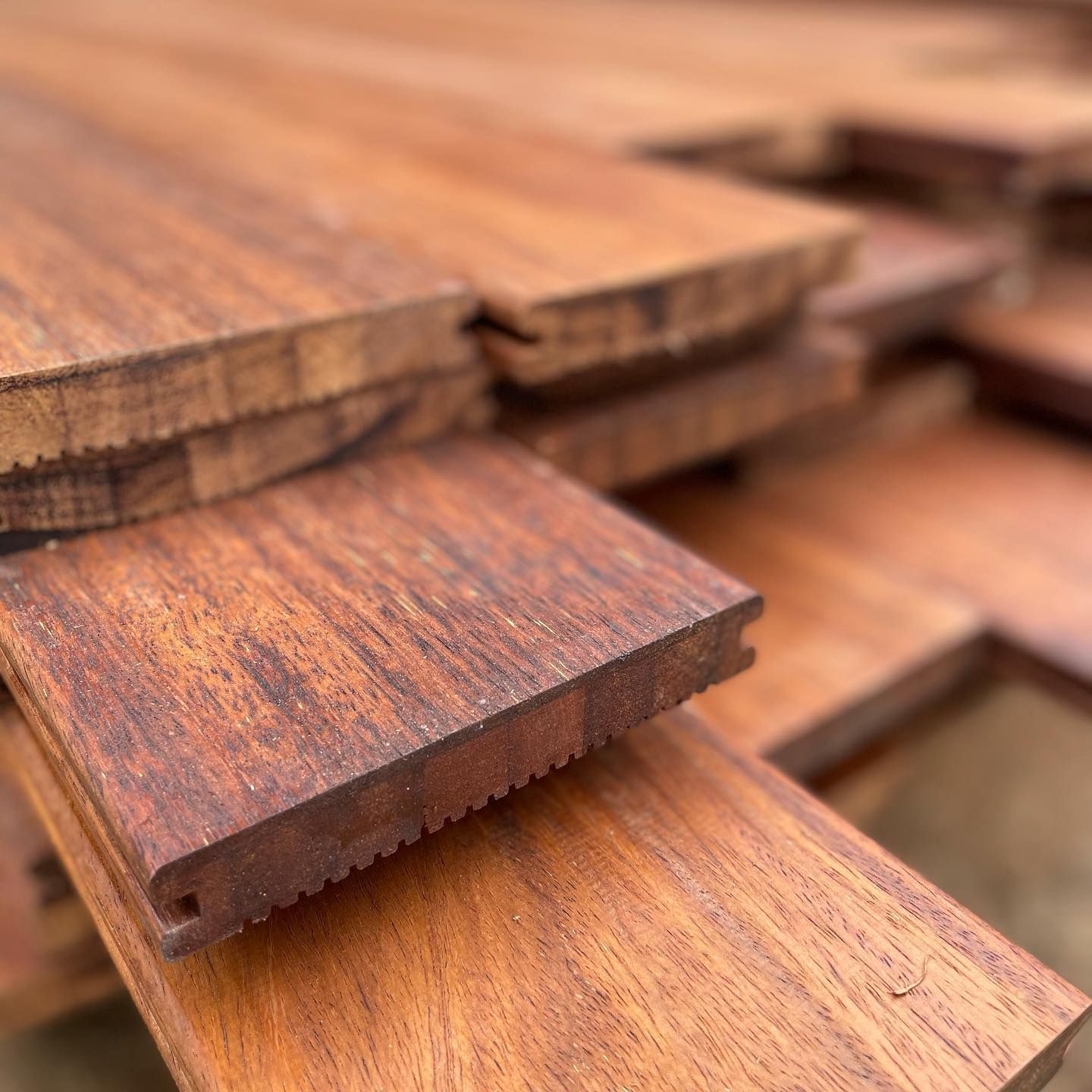A Pile of Wooden Boards Stacked on Top of Each Other — Evoke Building Group In Ballarat Central, VIC