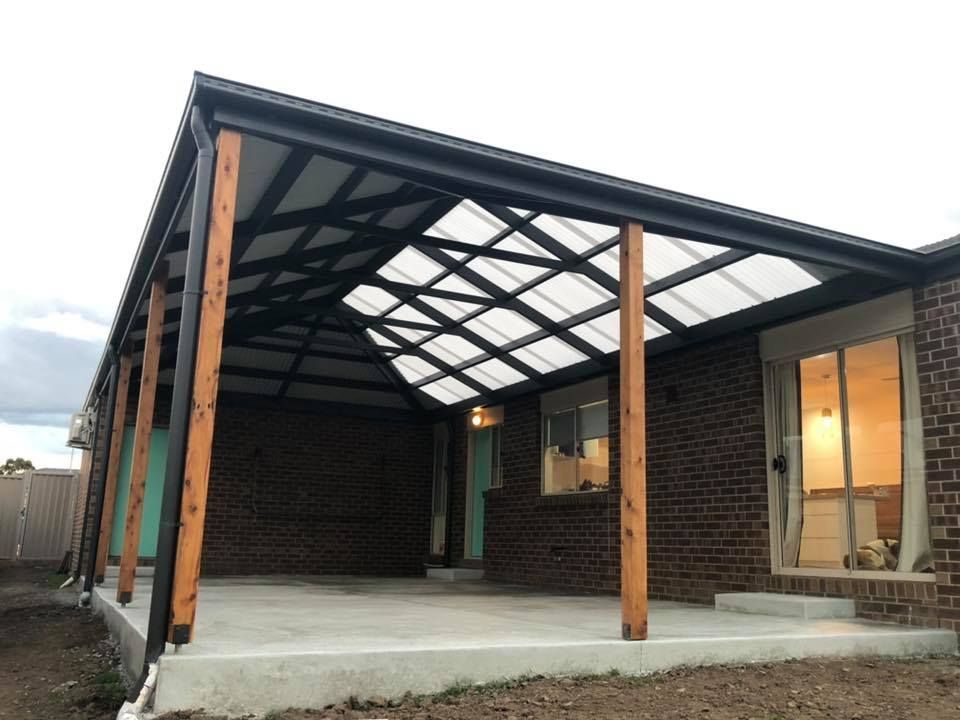 A Brick House With a Covered Porch and a Clear Roof — Evoke Building Group In Ballarat Central, VIC