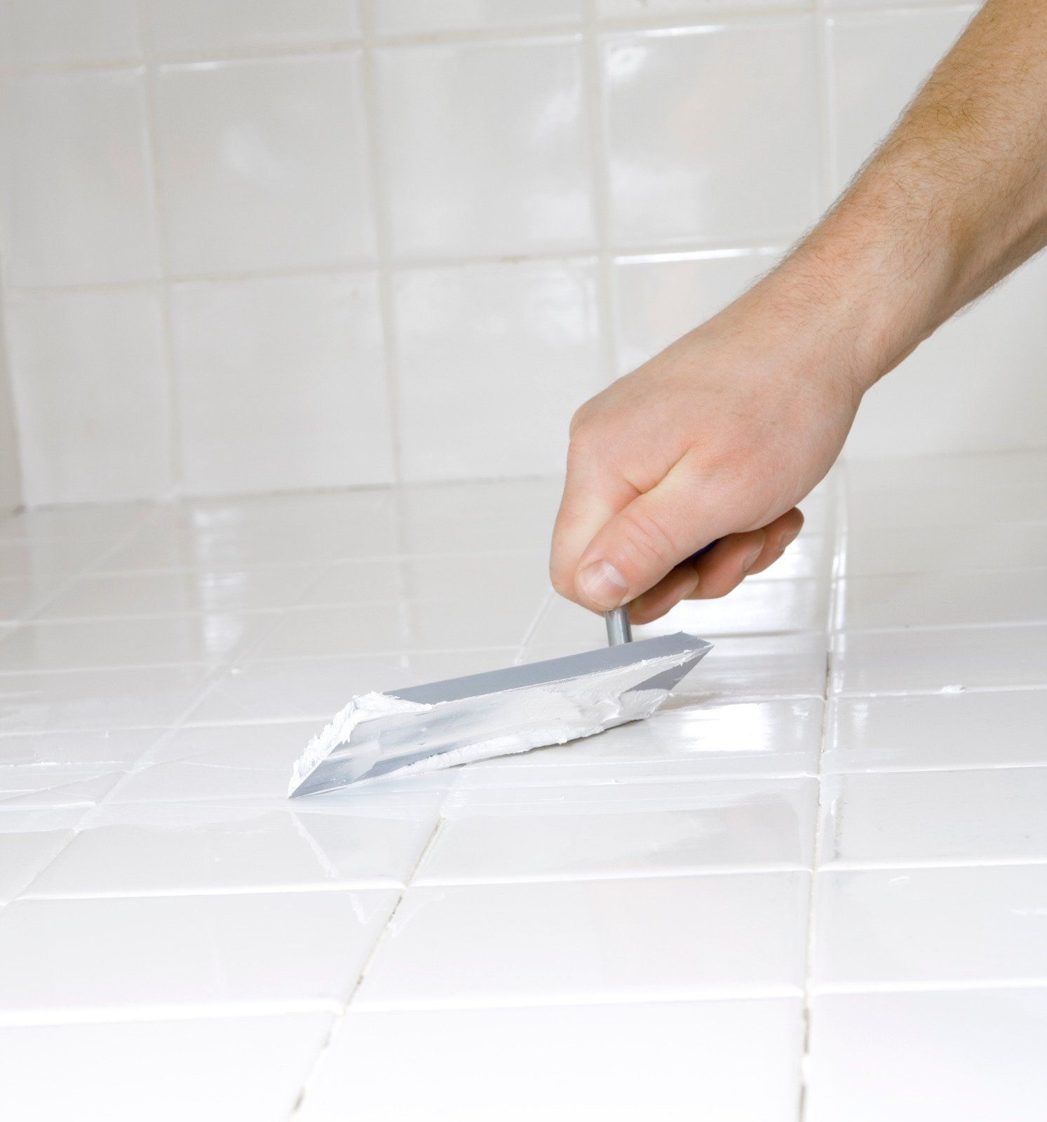 A close up of a white marble tile texture.