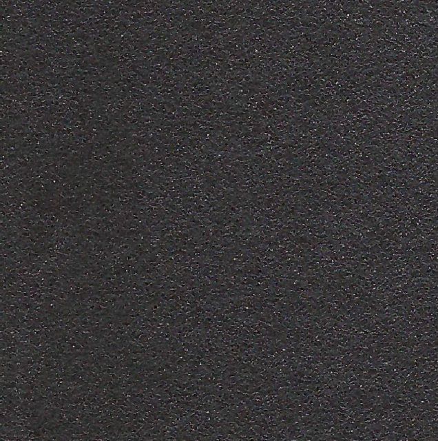 Dark Steel metallic finish on lightweight plywood, giving automotive cabinetry a rugged industrial look.