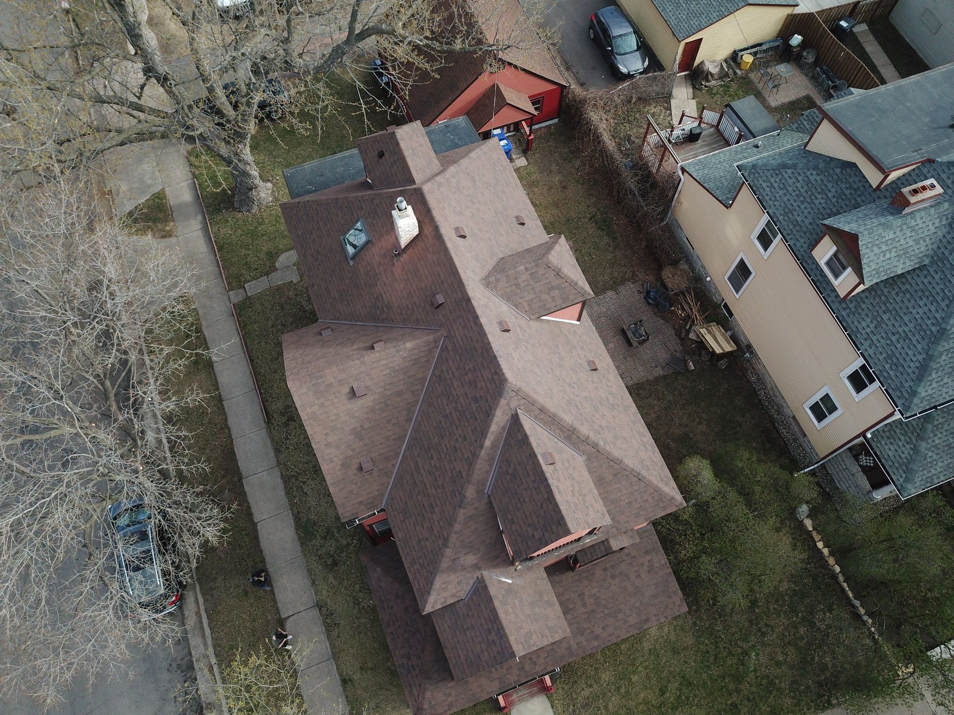 An aerial view of a house with a new roof