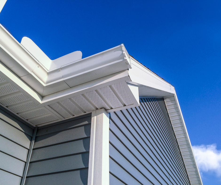 Light blue siding with white gutters on a house in the Twin Cities