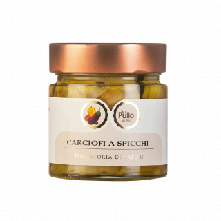 Vasetto di vetro con cuori di carciofo di Püilo sott'olio, coperchio in rame ed etichetta color crema.