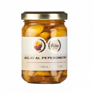 Barattolo di peperoncini e aglio conservati con etichetta