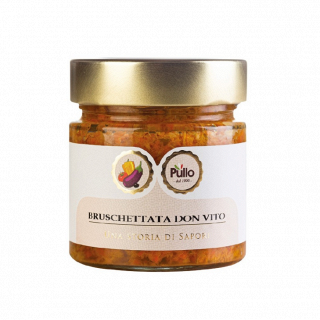 Vasetto di salsa per bruschette Pulio “Don Vito” con coperchio dorato ed etichetta bianca su sfondo bianco.