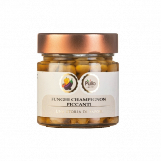 Barattolo di funghi champignon piccanti Pulo con coperchio color rame su sfondo bianco