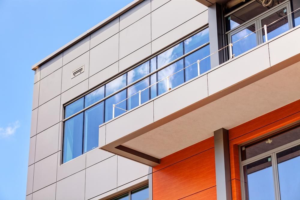 A Large Building with A Lot of Windows — Architectural Glass Solutions QLD in Cooroy, QLD