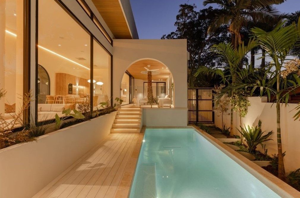 Exterior View of a Modern Home With a Pool, Wooden Deck — Architectural Glass Solutions QLD in Cooroy, QLD