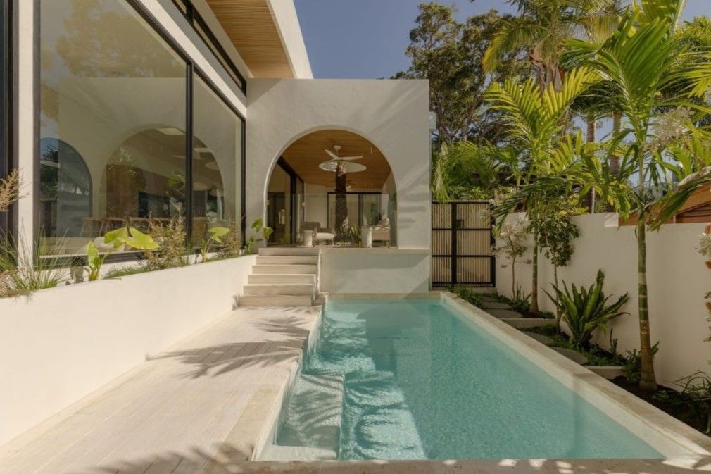 Exterior View of a Modern Home With a Small Swimming Pool — Architectural Glass Solutions QLD in Cooroy, QLD