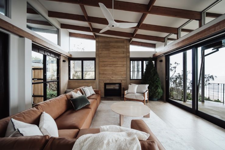 A Living Room Filled With Furniture — Architectural Glass Solutions QLD in Cooroy, QLD