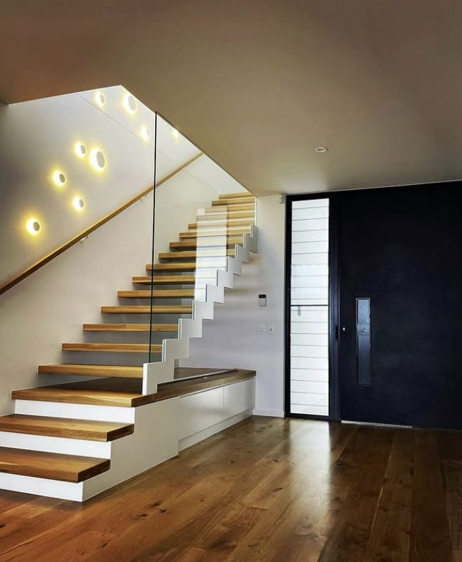 A Wooden Staircase, White Walls & Lights, Glass Railing & Entry Door — Architectural Glass Solutions QLD in Cooroy, QLD
