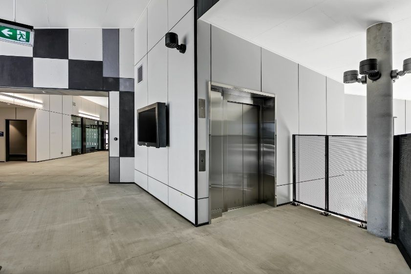 There is an Elevator in the Middle of the Room — Architectural Glass Solutions QLD in Cooroy, QLD