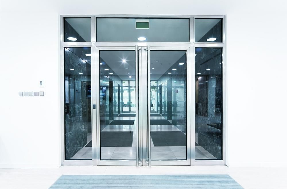 A Large Glass Door With a Lot of Windows — Architectural Glass Solutions QLD in Cooroy, QLD