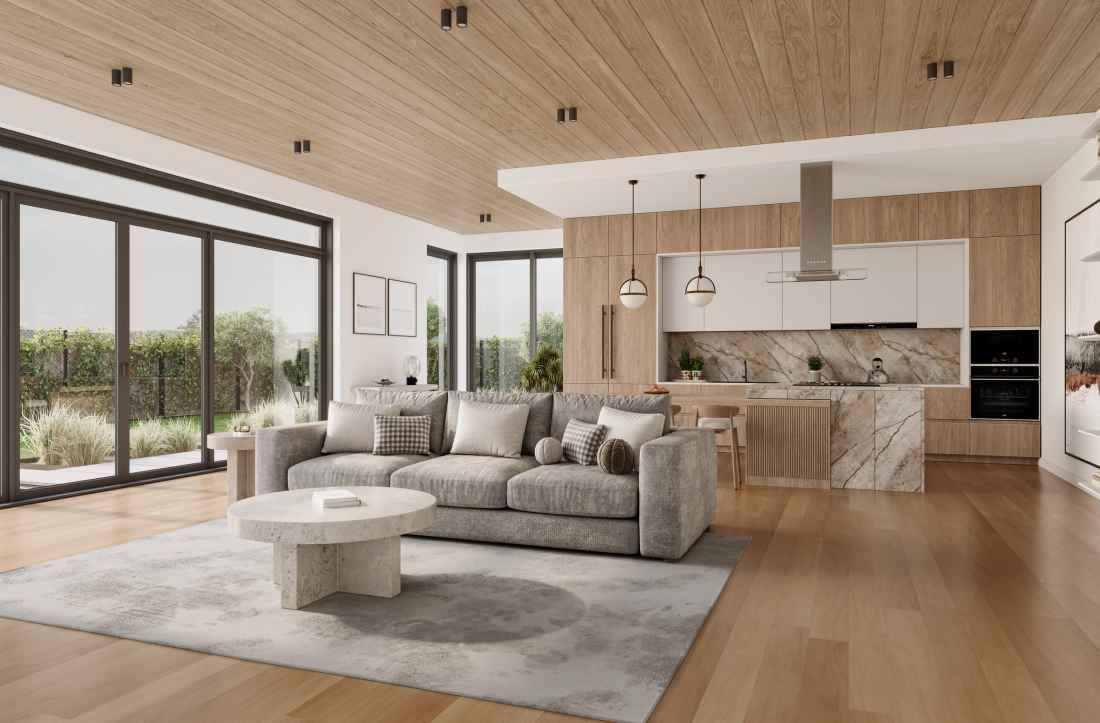 A living room with a couch , coffee table , and large windows.