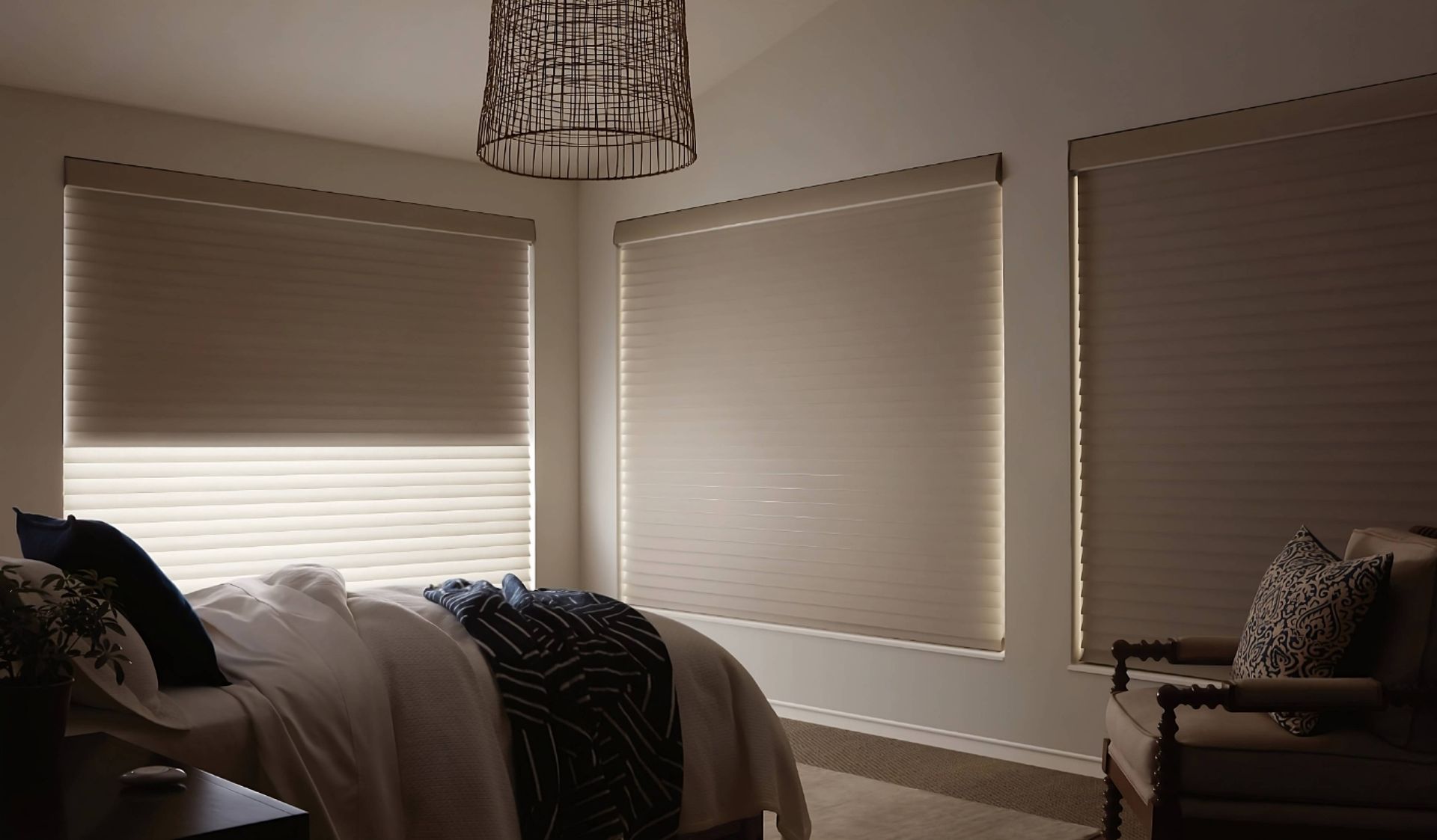 Hunter Douglas custom window treatments on large bedroom windows with exclusive fabrics and opacity