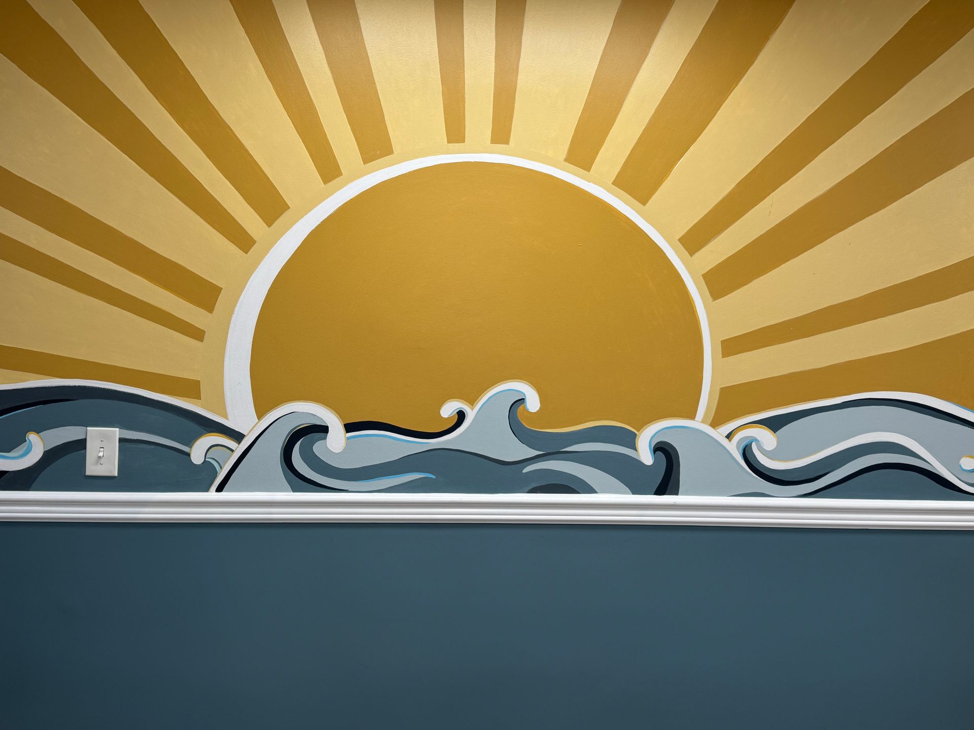 Stylized sunrise over ocean waves, with golden rays in the sky and blue water below