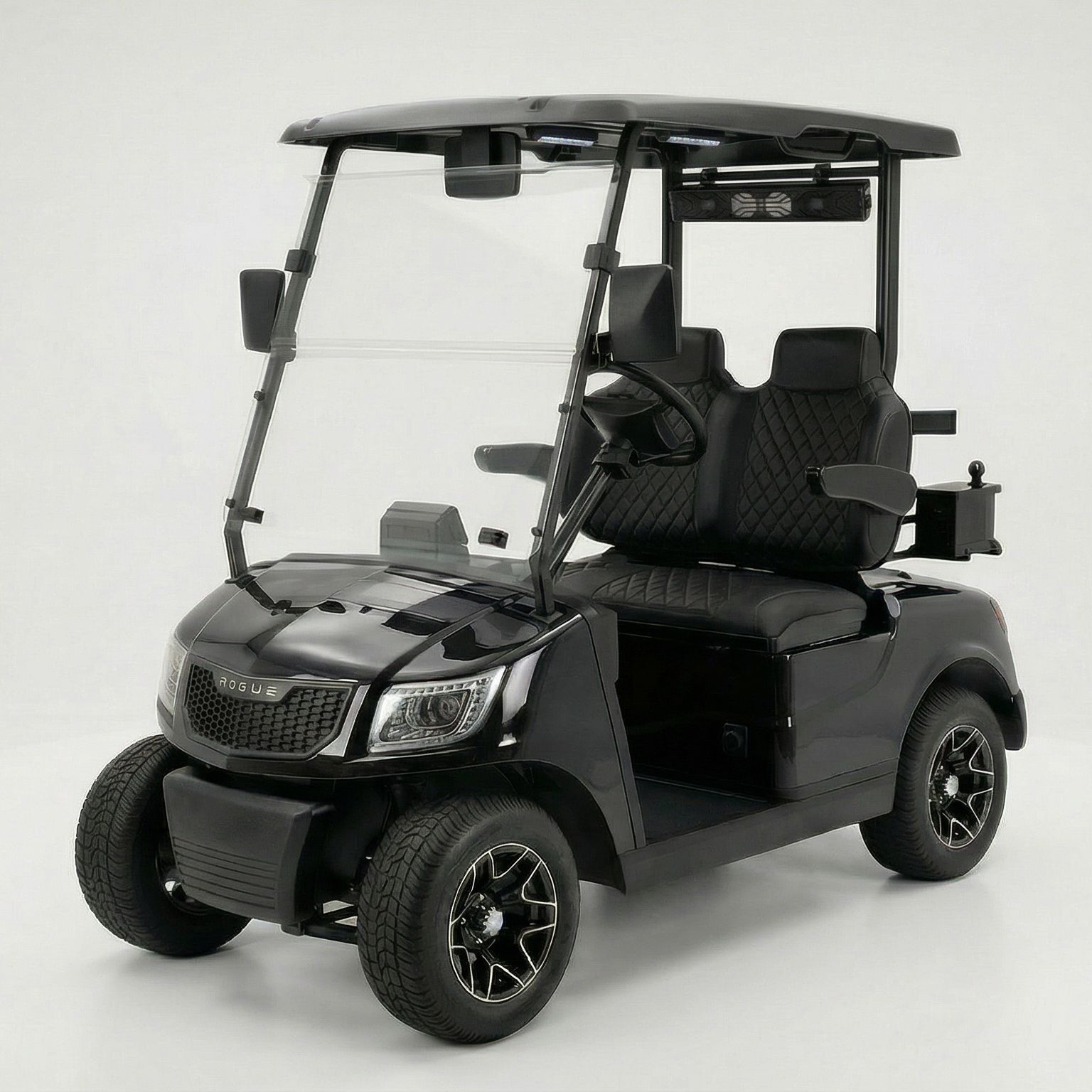 Black golf cart with black seats, windshield, and canopy on a white background.