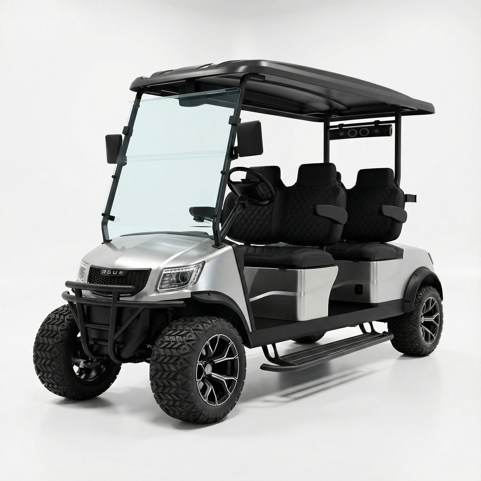 Silver golf cart with black roof, seats, and large wheels.