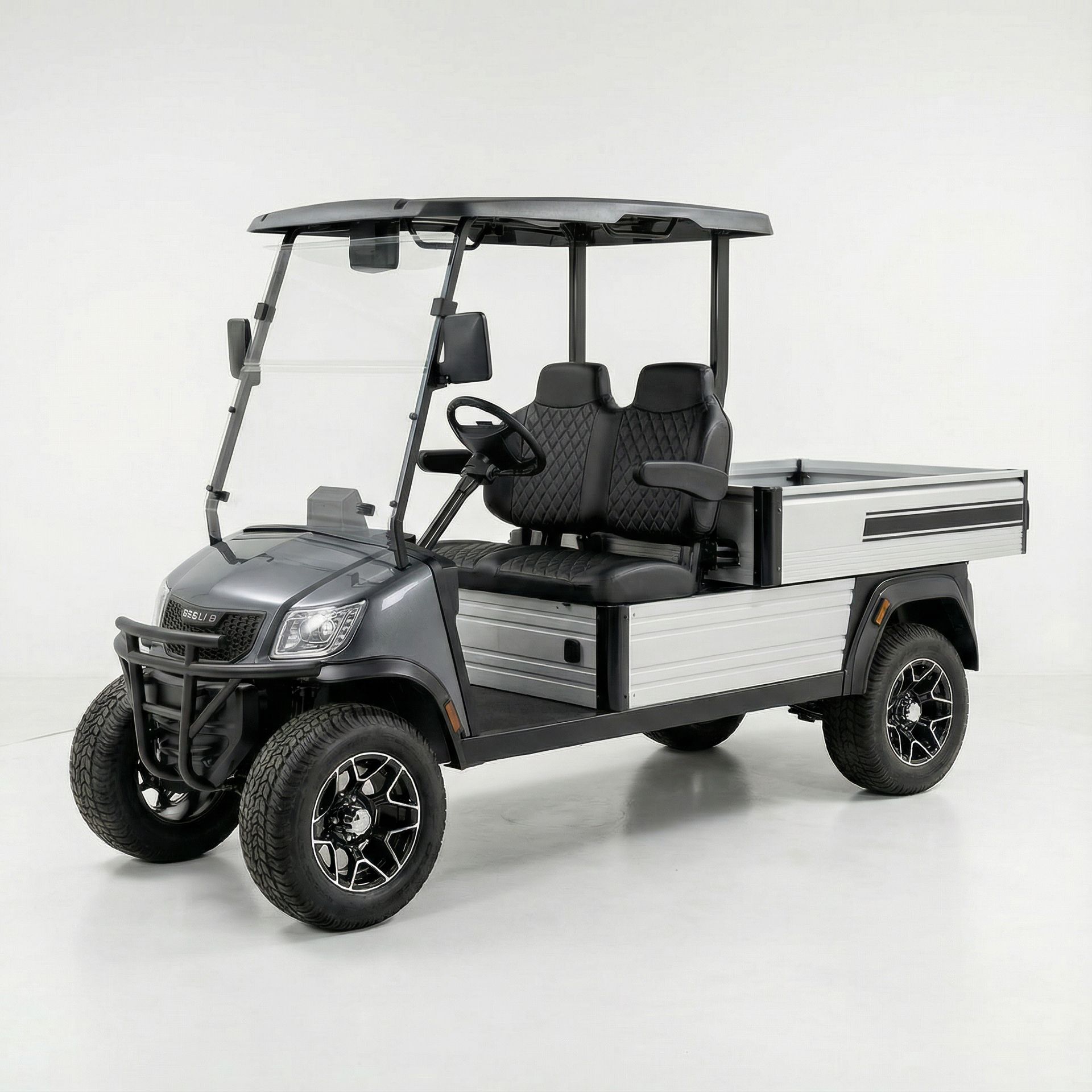 Gray utility vehicle with a cargo bed on a white background.