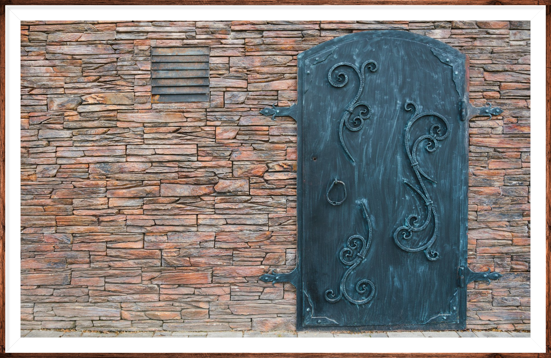 decorative iron door with green tarnish paint job