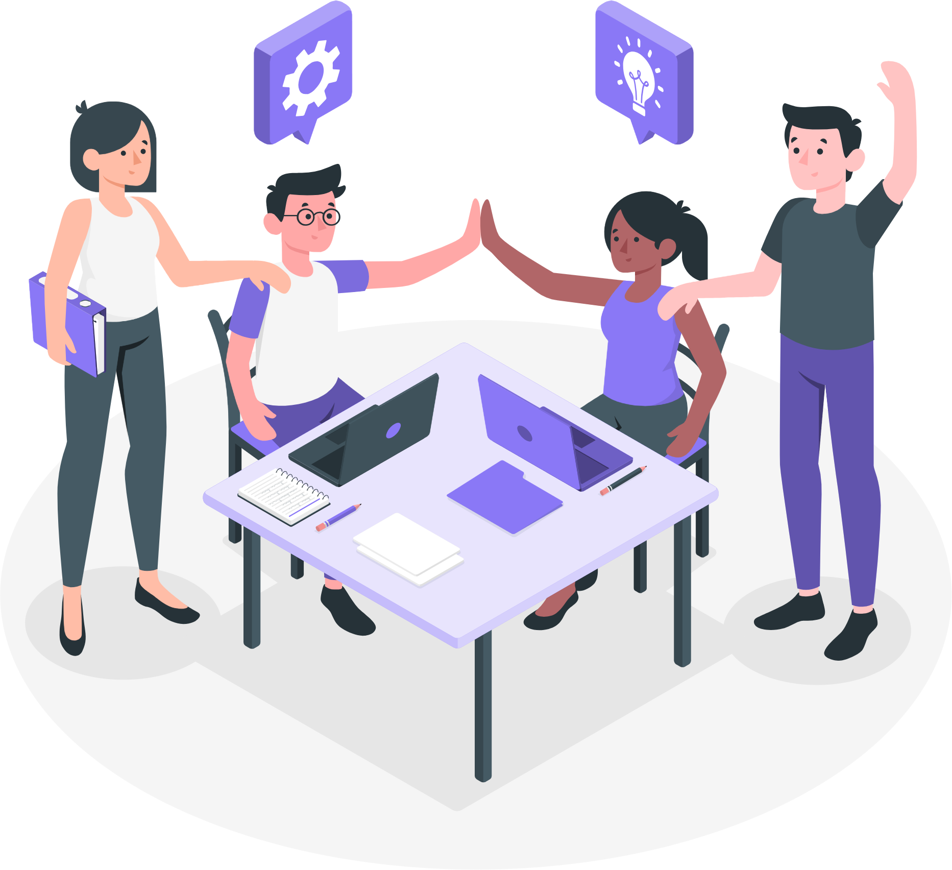 A group of people are giving each other a high five while sitting around a table with laptops.