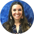 A woman is smiling in a circle with a blue background.