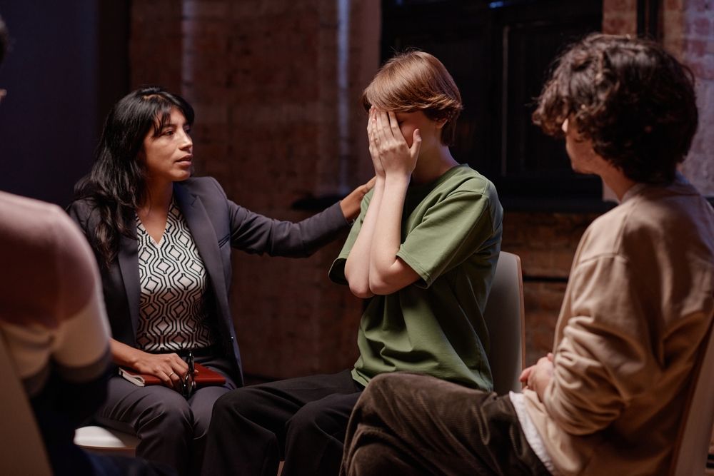 Therapist Comforts a Person With Their Hands — AT My Place Counselling and Psychotherapy in Neutral Bay, NSW