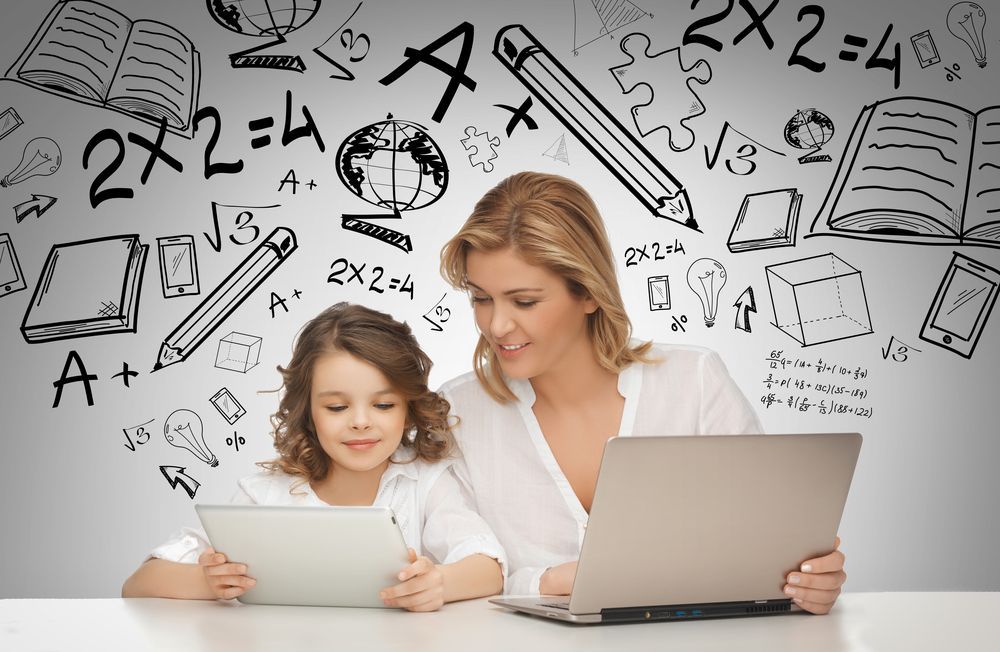 Woman and Girl Using a Laptop and Tablet, Surrounded by Drawn School — Shane Kelly Communications in Lennox Head, NSW