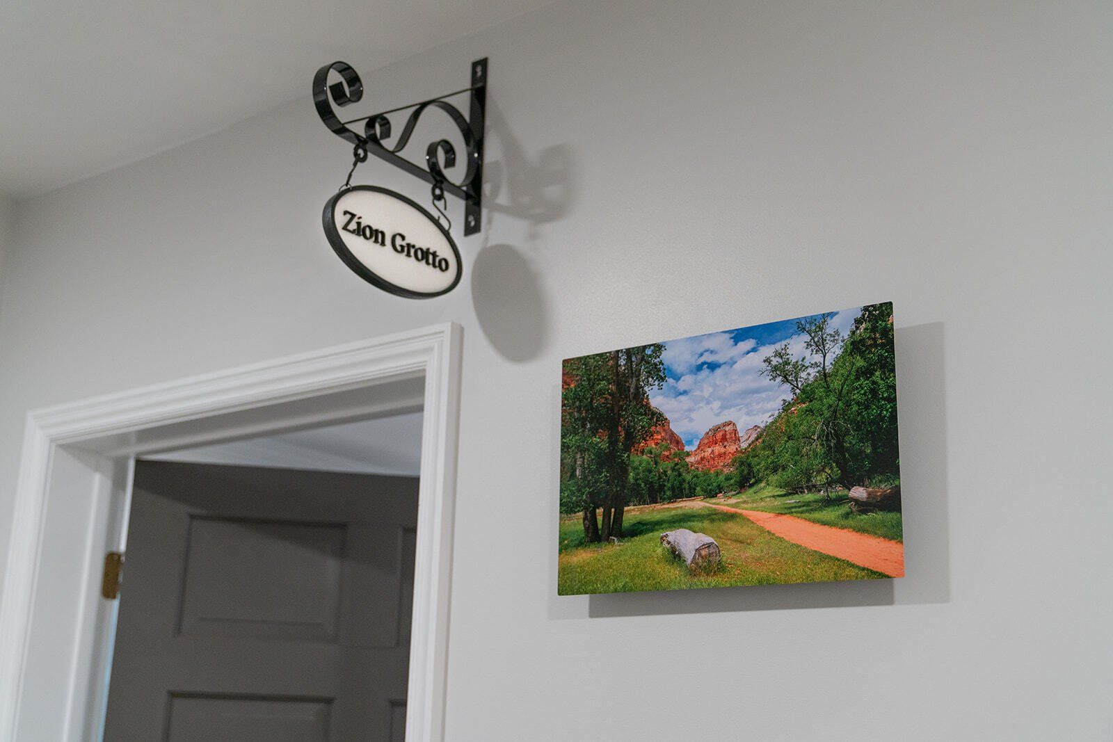 sign and picture on wall