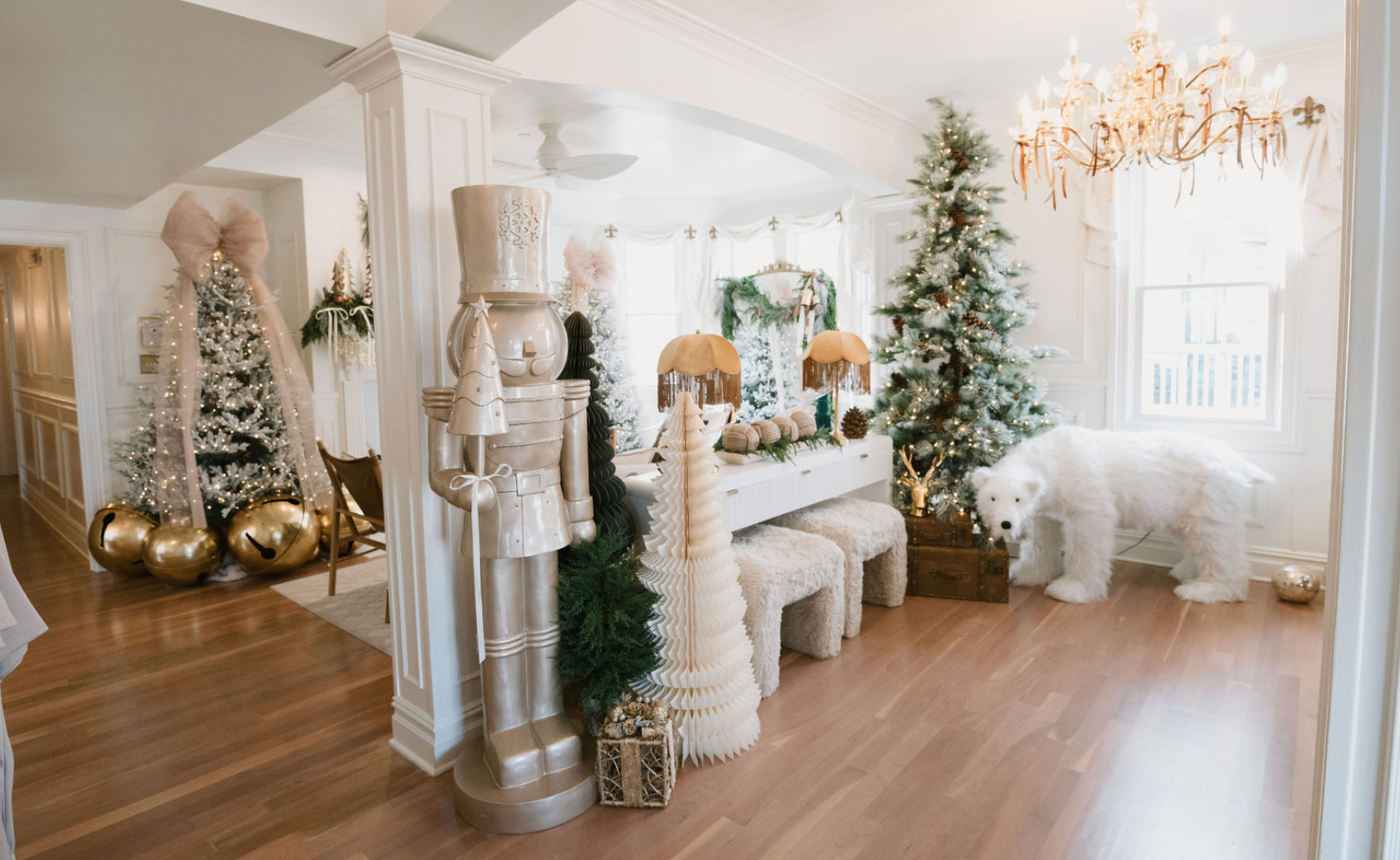 Festive room decorated for Christmas with a nutcracker, Christmas trees, and a polar bear.