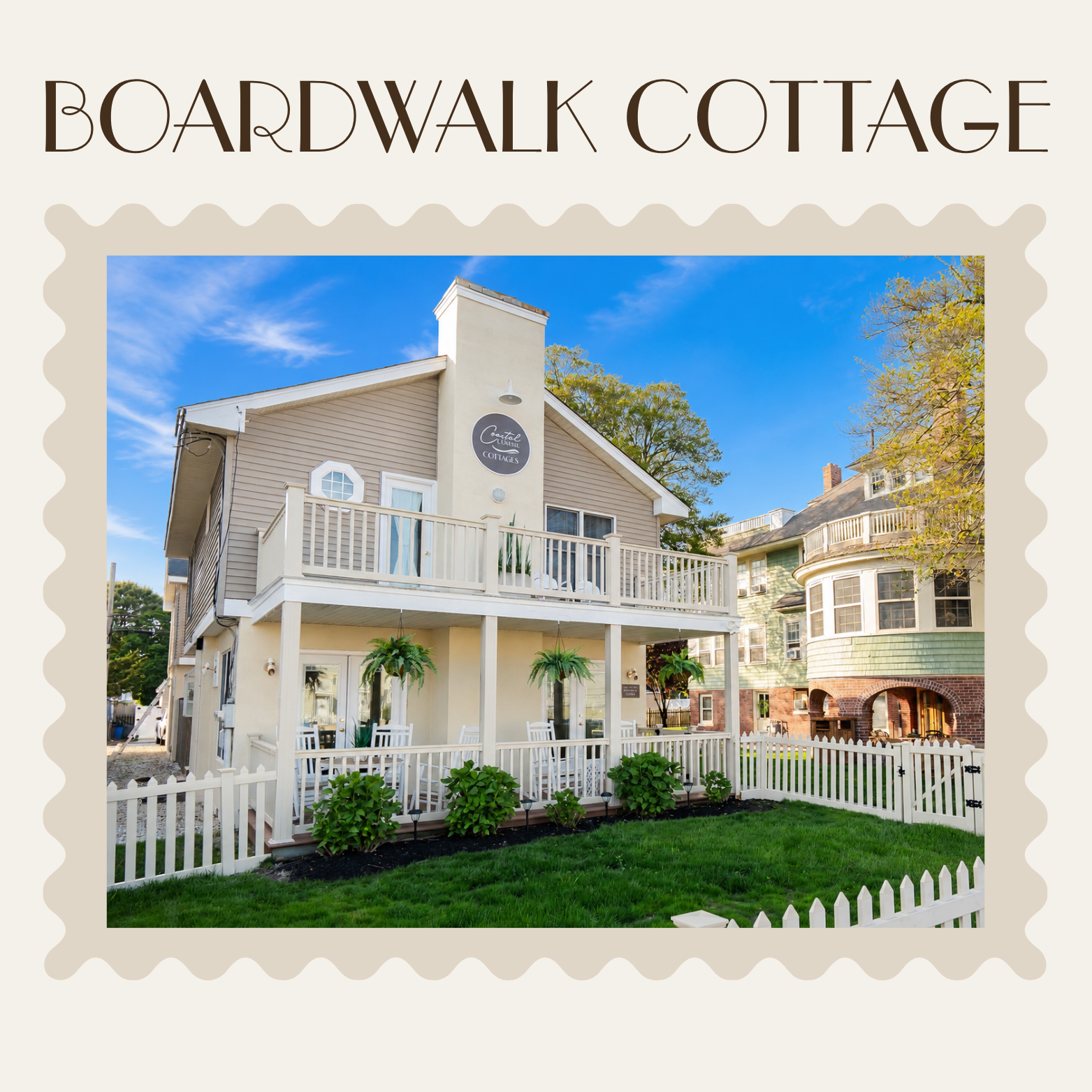 Boardwalk Cottage beach house with white porch, balcony, and blue sky in front yard
