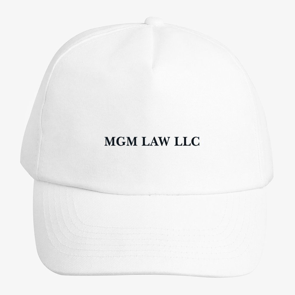 A white baseball cap that says mgm law llc